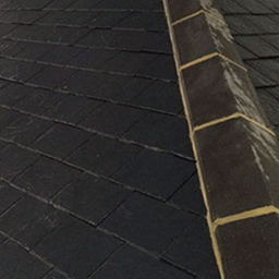 edge of roof with slate roof tiles
